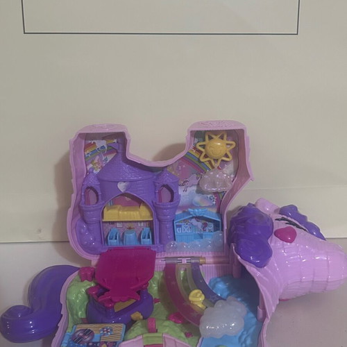 Polly Pocket Unicorn Party Playset used by Mattel