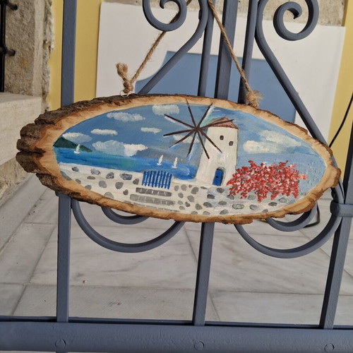 Handmade wooden wall decor with Cycladic art style