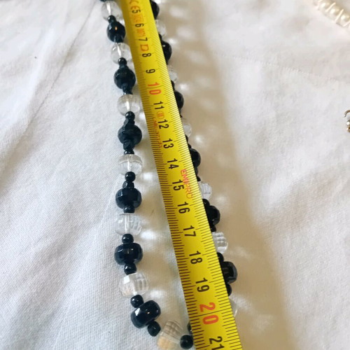 Necklace with beads in black and transparent colors like new