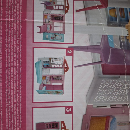 Barbie dollhouse used with box, dolls and accessories