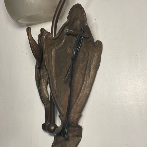 Bronze wall light like new with carved white glass and angel shape
