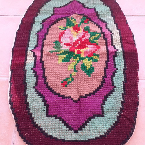 Handmade oval embroidered rug like new