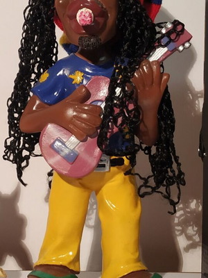 Decorative figure ceramic statue like new Rastafarian guitarist