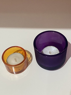 Set of 2 used tealight holders in orange and purple