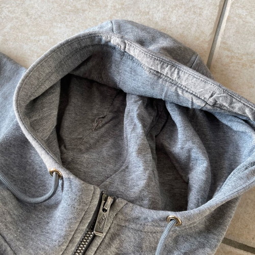 Nike jacket used gray with gold details and small defects