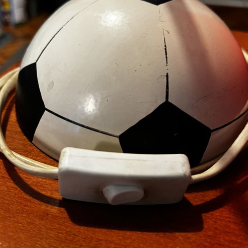Football-shaped table lamp