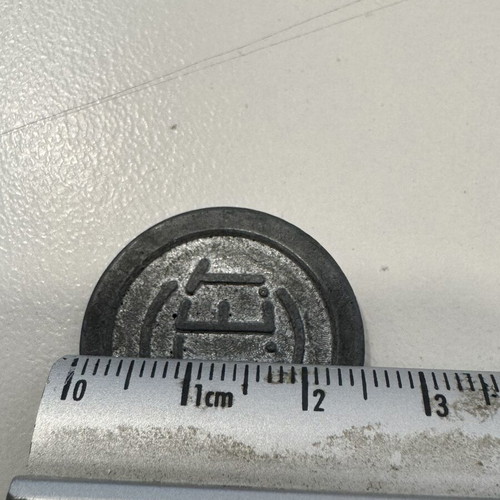 A.G.E.T. metal token used, rare 1970s cantina brand