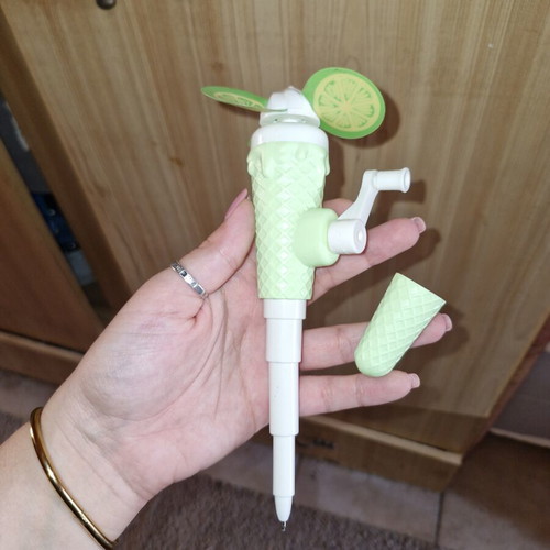Pen with fan on top new, ink writes normally