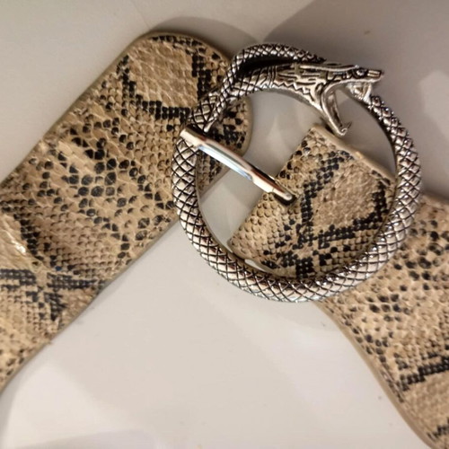 Beige elastic belt used, size 75