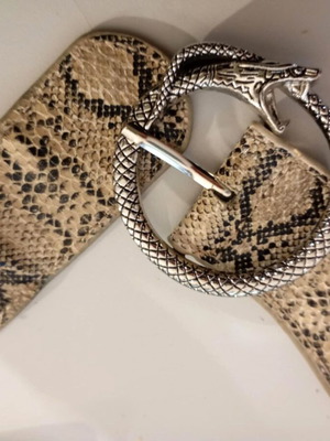 Beige elastic belt used, size 75