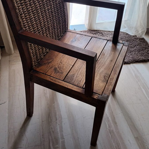 Armchair made of solid wood with woven coconut back like new