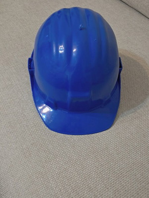 Construction helmet like new, blue plastic with adjustable fit