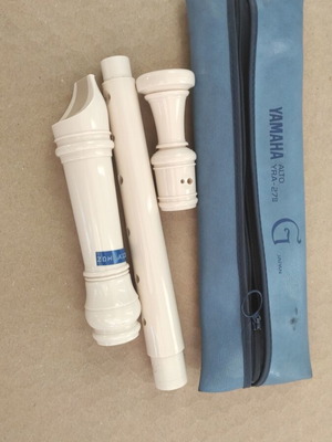 Yamaha flute used with blue leather carrying case and zipper
