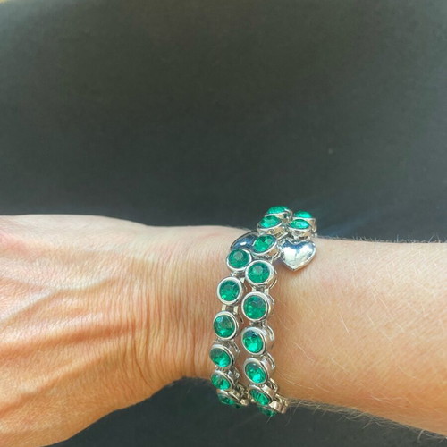 Snake bracelet with green stones like new