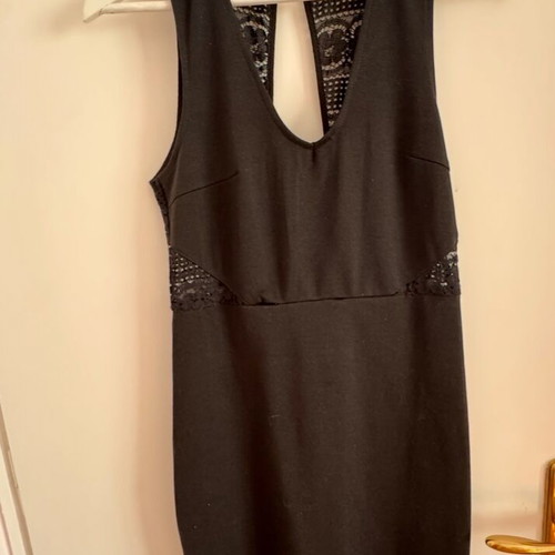 Little black dress used, black with lace effect and neckline