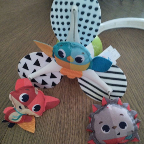 Tiny Love rotating toy used with music and colorful animals