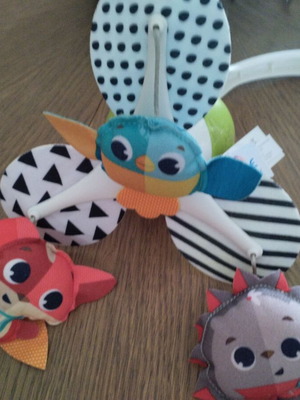 Tiny Love rotating toy used with music and colorful animals