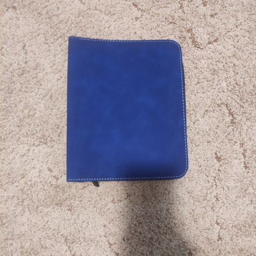 Toploader binder with 112 pockets and zipper, excellent condition