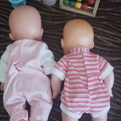 Baby dolls with extra toys, pack of 2