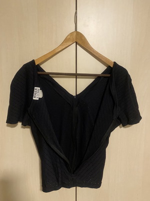 Vogue black elastic blouse with V-neck and zipper