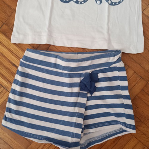 New College girls' set with striped skort and sequin bow top, used, size 6