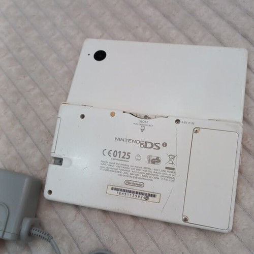 Nintendo DS used with original charger, no stylus