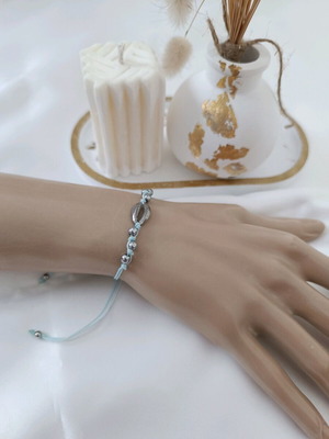 Macrame bracelet with stainless steel shell and beads, turquoise and silver