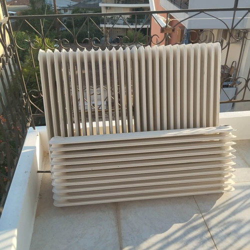 Cast iron radiators used, set of two, sturdy construction