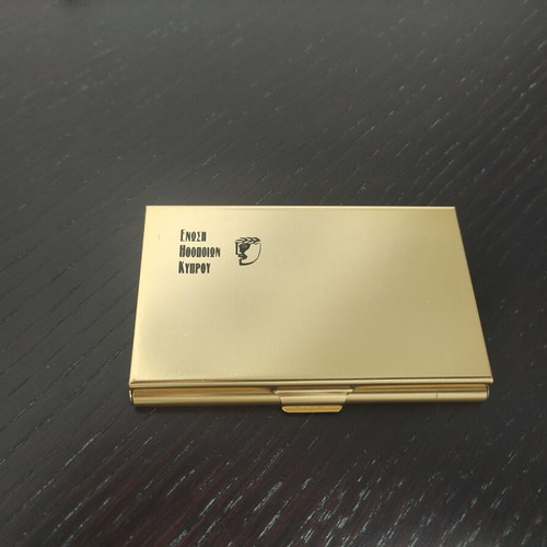 Card holder with Ένωση Ηθοποιών Κύπρου inscription like new, gold color