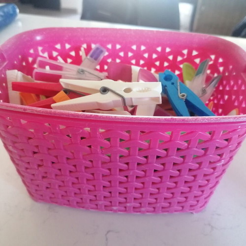 Basket with clothespins like new