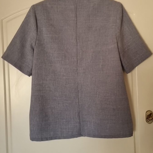 Shirt with shoulder pads like new, short sleeve, loose fit