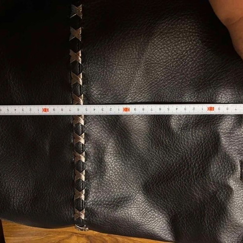Black shoulder bag tote style like new with inner pockets and silver handle detail