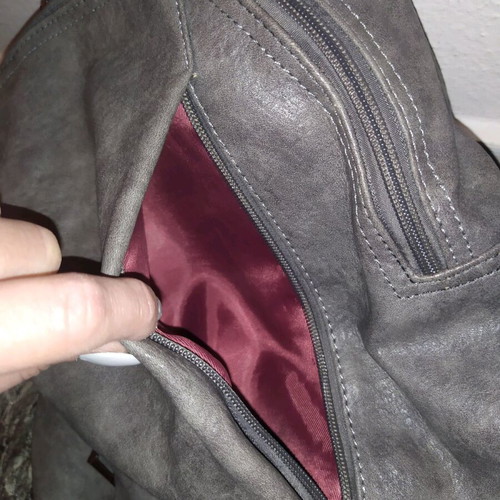 Backpack bag like new with two front hidden pockets gray