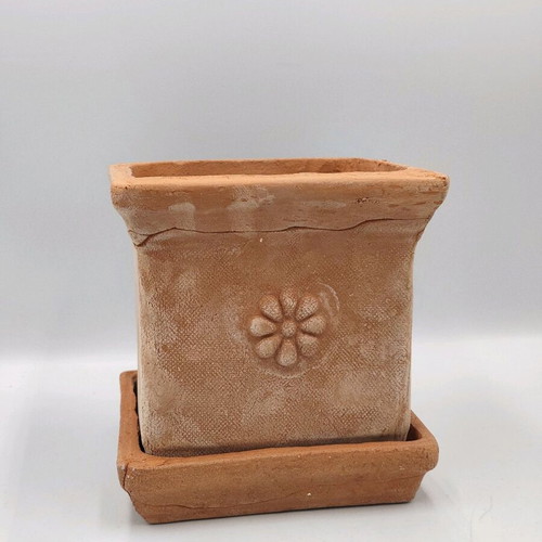 Square ceramic pot new from high-quality clay with saucer