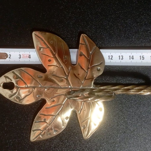 Vintage brass wall hook with leaves used
