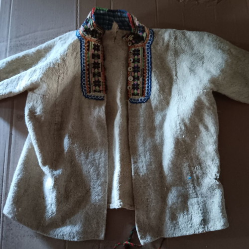 Collectible traditional costume pieces used, 2 items