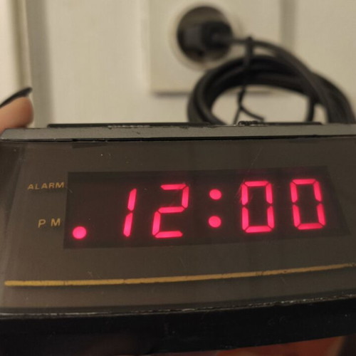 Digital clock used with power cord