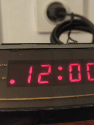 Digital clock used with power cord