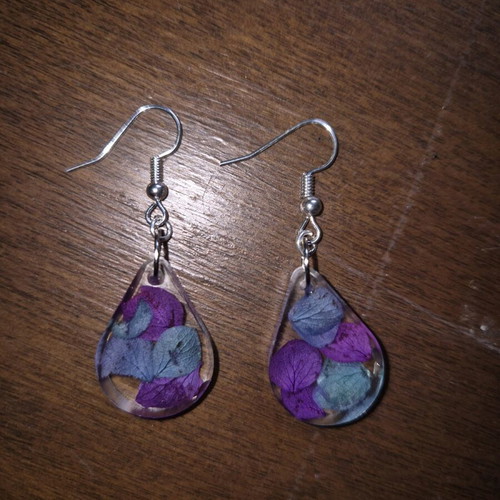 Liquid glass earrings new with purple and turquoise dried flowers