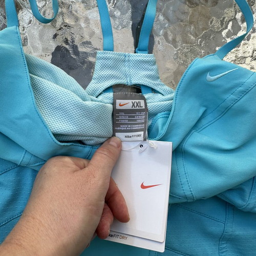 Nike top new, fits size M, blue