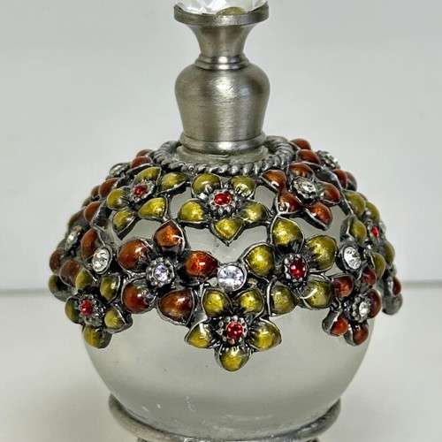 Vintage glass perfume bottle with floral enamel decoration