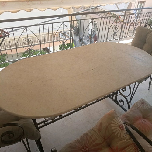 Marble garden table with four chairs used, heavy construction