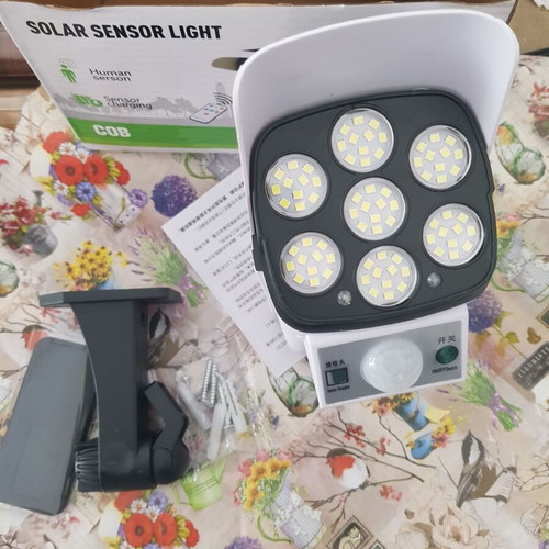 Solar floodlight with motion sensor C1232 and 77 LEDs, new