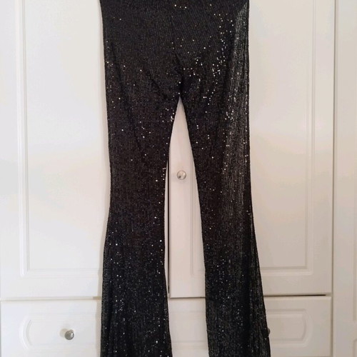 Impressive black pants size S with rhinestones for evening wear like new