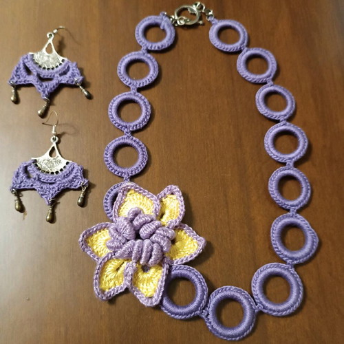 Handmade crochet necklace and earrings in purple with yellow daisy new