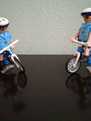 Playmobil cyclists in like new condition