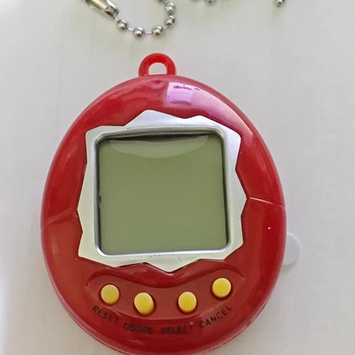Retro digital virtual pet with chain, like new