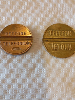 Telephone tokens 2 old, like new