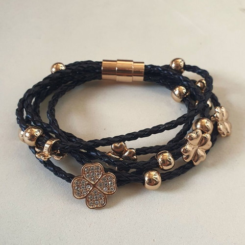 Black braided bracelet with gold beads and crystal clover like new