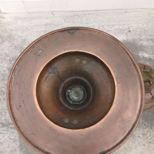 Old copper brazier used with brass handles and decorative bird
